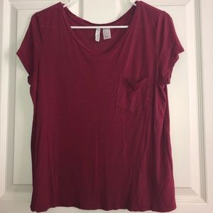 A fitted maroon tee